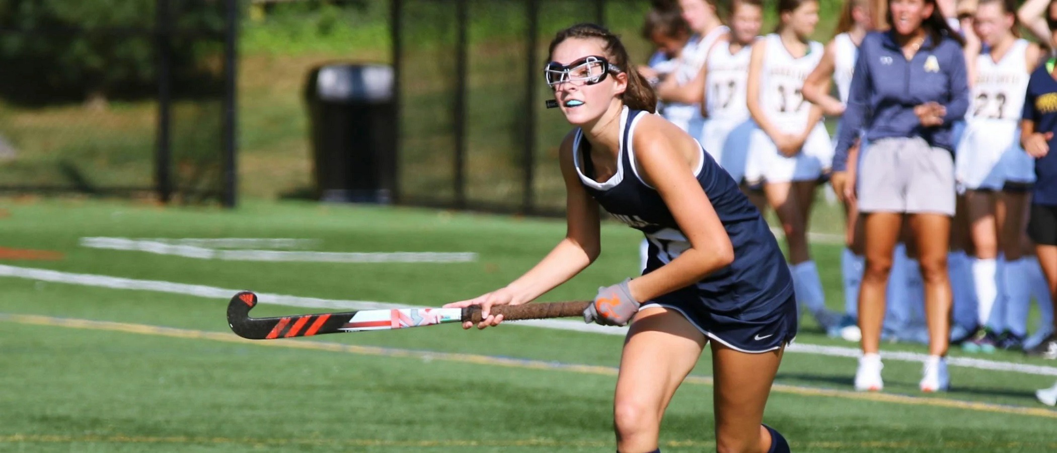 Field hockey player competing during a private lesson