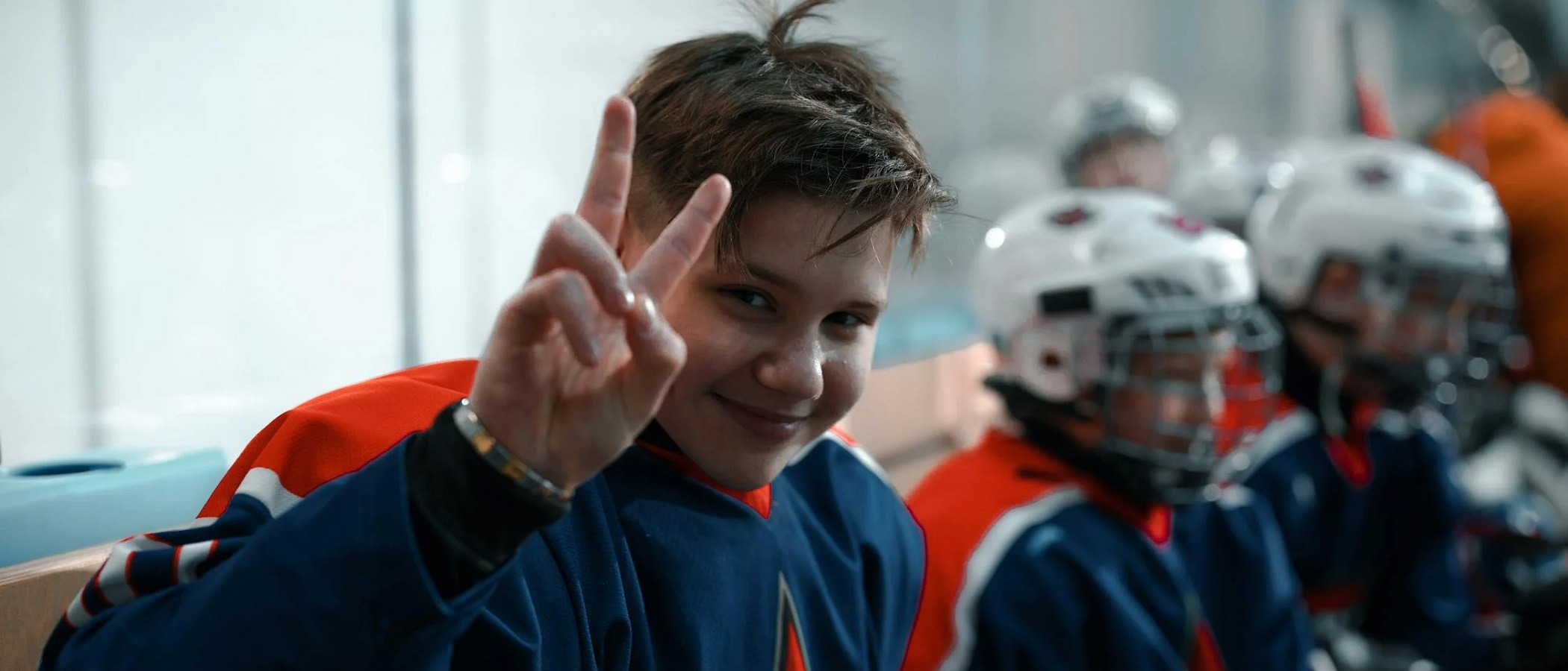 Ice Hockey Player smiling after a private lesson