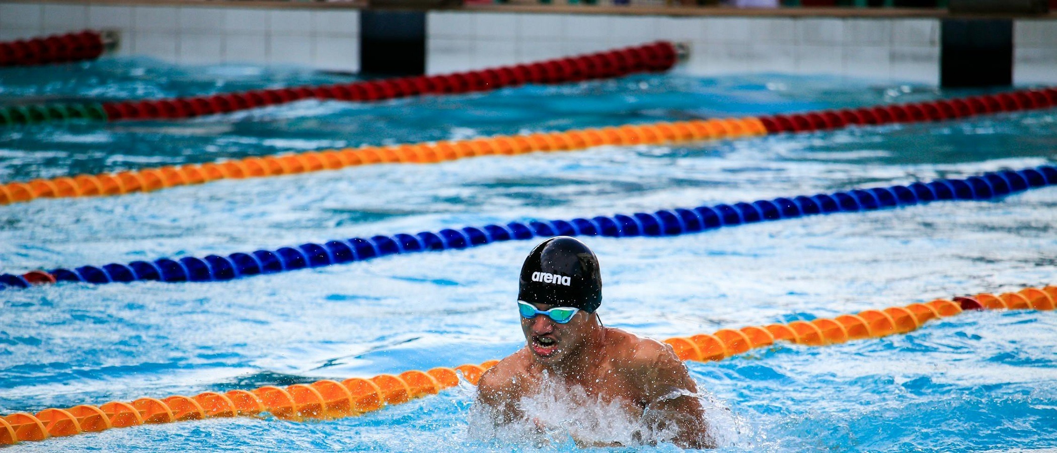 Swimmer training during a private lesson