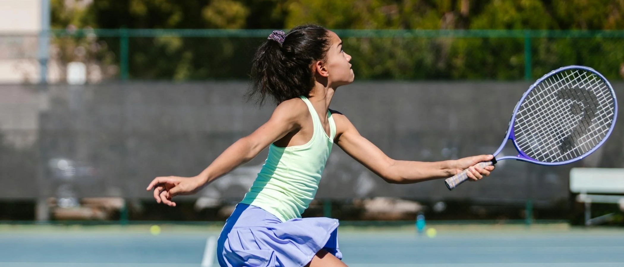 Tennis player training during a private lesson