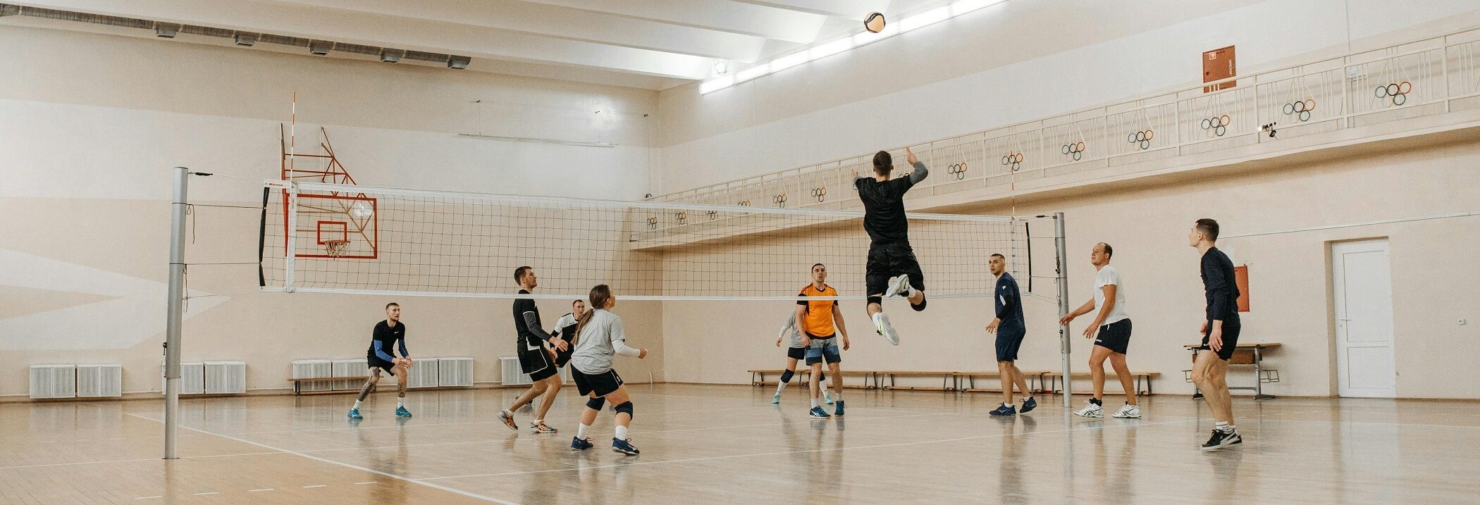 Athletes training together during a private volleyball lesson